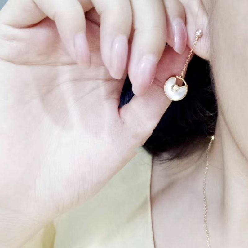 Ca*t1er earrings
